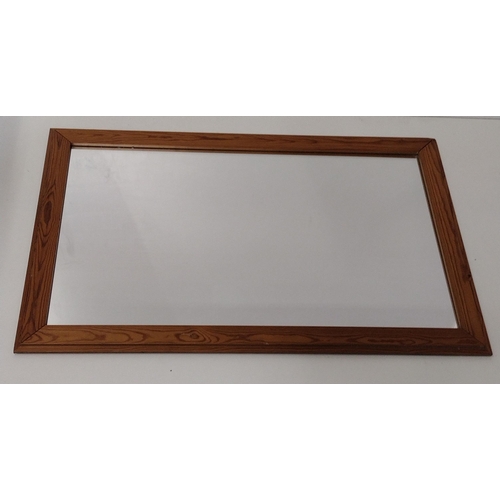 424 - Pine framed wall mirror, 118x74cm. Collection only.