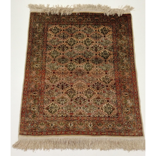 426 - Silk rug measuring 92x74cm. Collection only.