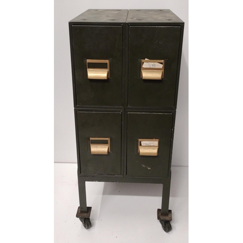 439 - Vintage 4-drawer metal cabinet on castors, 74h x 31w x 38d cm. Collection only.