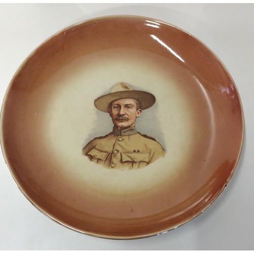 259 - Interesting lot of Boer War themed items including a Prattware plate depicting Robert Baden-Powell, ... 