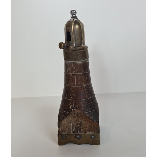 264 - Antique brass and wood table lamp in the form of a lighthouse, standing 20cm. Shipping Group (A).