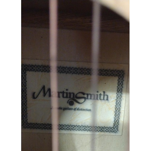 298 - Martin Smith acoustic guitar. Collection only.