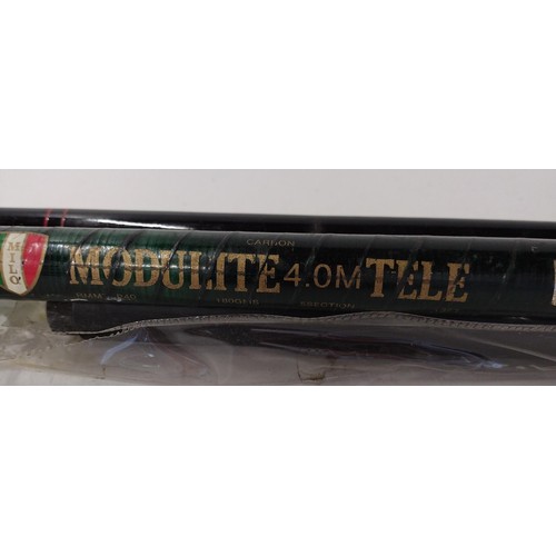 395 - Modulite 4mtr fishing rod with various poles Collection only.