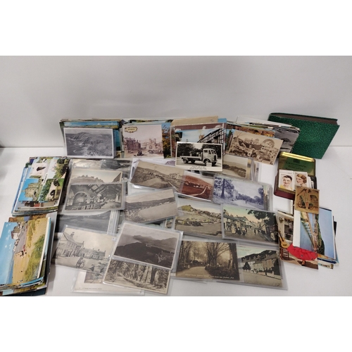 100 - Assortment of vintage and later postcards. Shipping Group (A).