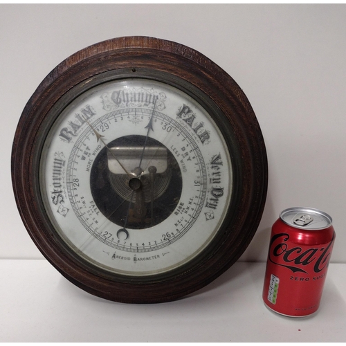 103 - Circular oak-framed barometer. Collection only.