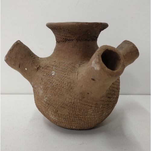 139 - Early South American four-spout pottery vessel. Shipping Group (A).