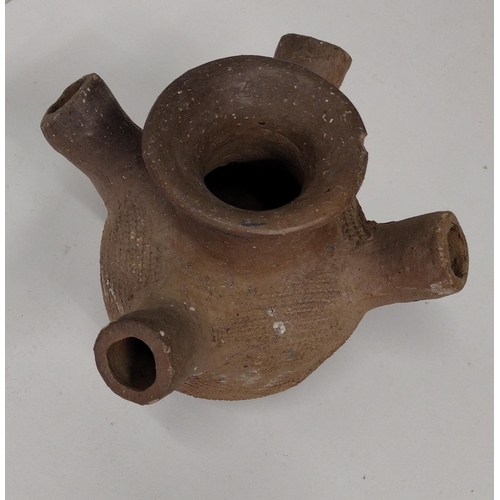 139 - Early South American four-spout pottery vessel. Shipping Group (A).