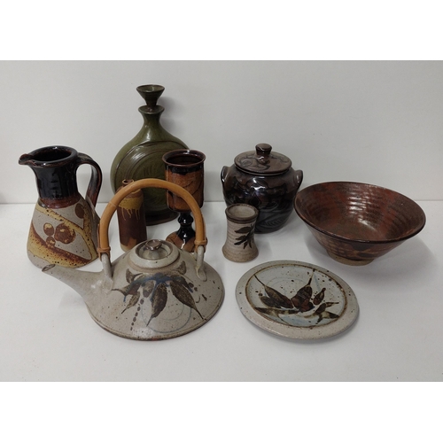 146 - (8) pieces of decorative earthen and glass ware. Collection only.