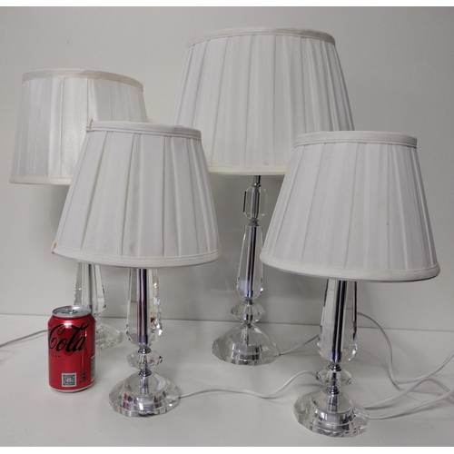 147 - (4) stylish table lamps with white shades. Collection only.