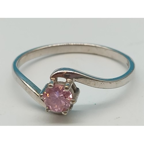 13 - 9ct white gold and pink stone set ring. Size N½. 1.5g. Shipping Group (A).