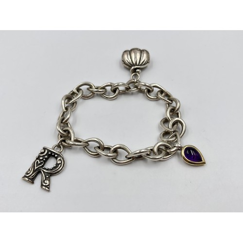 45 - .925 silver charm bracelet. Weight 36g. Shipping Group (A).