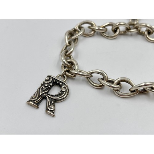 45 - .925 silver charm bracelet. Weight 36g. Shipping Group (A).