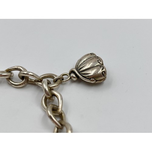 45 - .925 silver charm bracelet. Weight 36g. Shipping Group (A).