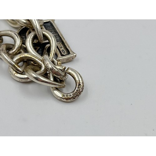 45 - .925 silver charm bracelet. Weight 36g. Shipping Group (A).