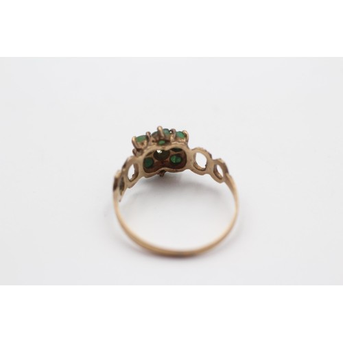 46 - 9ct gold emerald floral cluster ring featuring openwork shank. Size: Q, Weight: 1.7g. Shipping Group... 