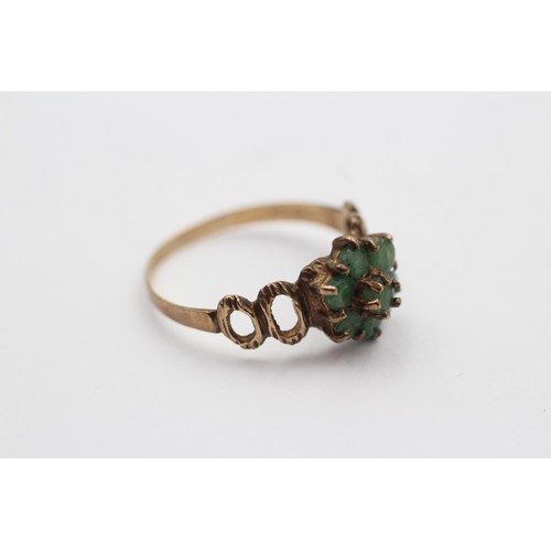 46 - 9ct gold emerald floral cluster ring featuring openwork shank. Size: Q, Weight: 1.7g. Shipping Group... 