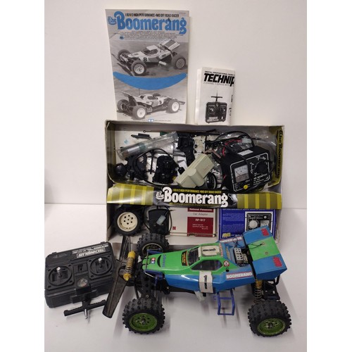 91 - Remote controlled Boomerang 4WD off road racer. Shipping Group (A).