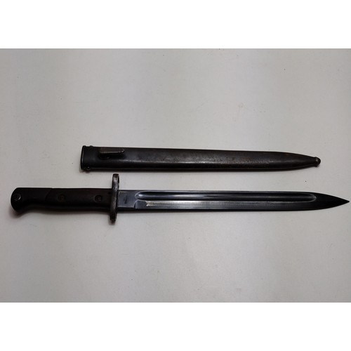 187 - WWI Wilkinson bayonet and scabbard. Shipping Group (B).