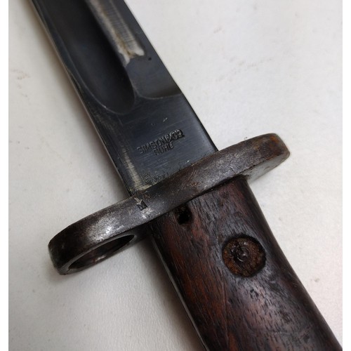 187 - WWI Wilkinson bayonet and scabbard. Shipping Group (B).