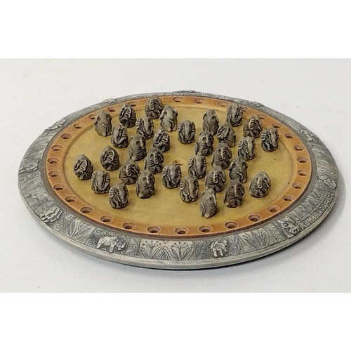 200 - Unusual solitaire game with pegs in the form of elephants. Approx. 28 cm in diameter. Shipping Group... 