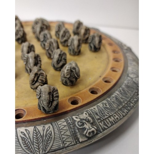 200 - Unusual solitaire game with pegs in the form of elephants. Approx. 28 cm in diameter. Shipping Group... 