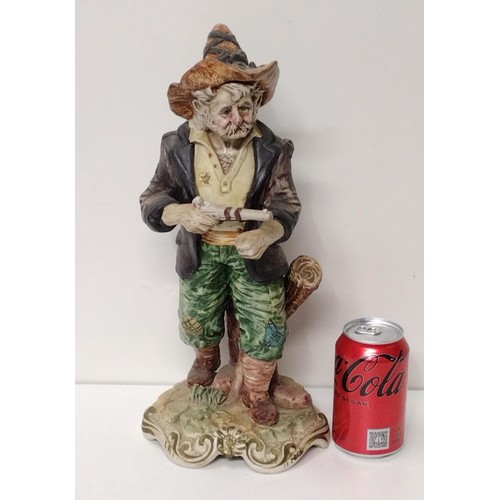 232 - Large Capodimonte figure standing 40cm. Shipping Group (A).