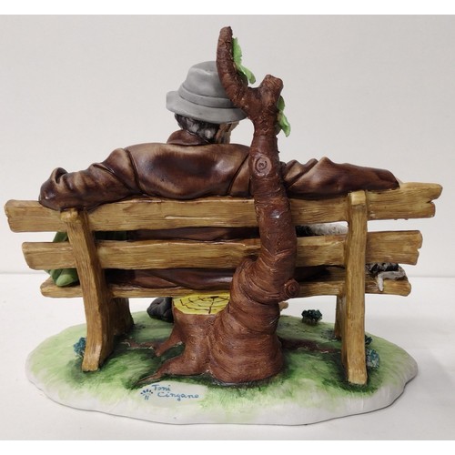 260 - Capodimonte figure of a Tramp on Bench with Dog, signed Tori Cigano. Shipping Group (A).