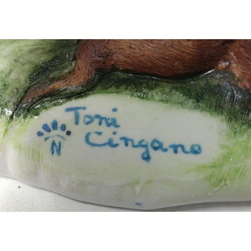 260 - Capodimonte figure of a Tramp on Bench with Dog, signed Tori Cigano. Shipping Group (A).