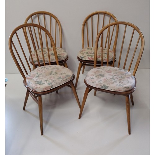 279 - (4) Ercol blonde hoop-back chairs with detachable seat pads. Collection only.