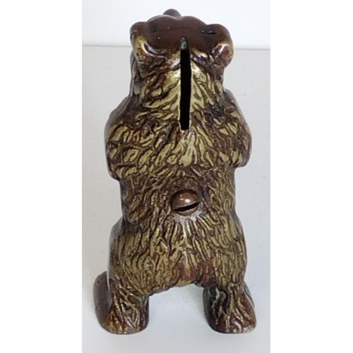 299 - Metal money box in the form of a standing bear, H:15 cm. Shipping Group (A).