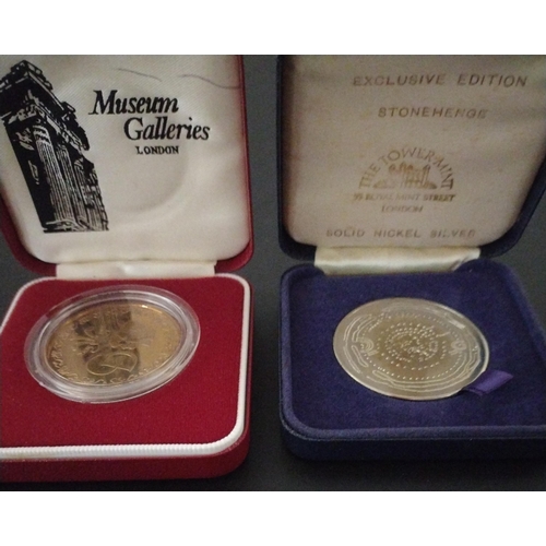 43 - 4 Cased Commemorative Coins: Stonehenge, City of London, St Paul's Cathedral, QE II Golden Jubilee. ... 