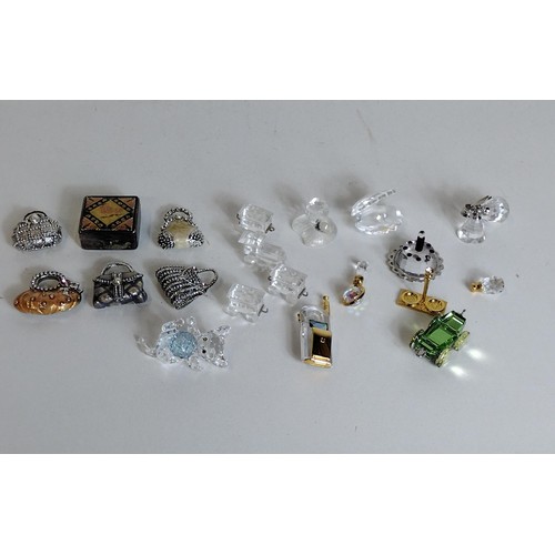 303 - Collectors cabinet with quantity of assorted miniature trinkets. Collection only.