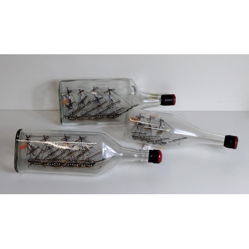 304 - (3) collectable model ships in bottles. Collection only.