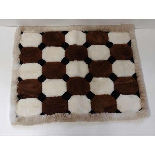 317 - Patchwork floor rug measuring 110x140 cm. Collection only.