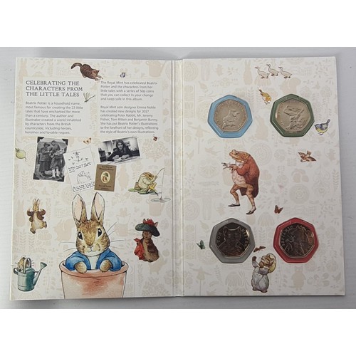 118 - Beatrix Potter 2017 50p Coin Album, complete with 4 Coins. Shipping Group (A).