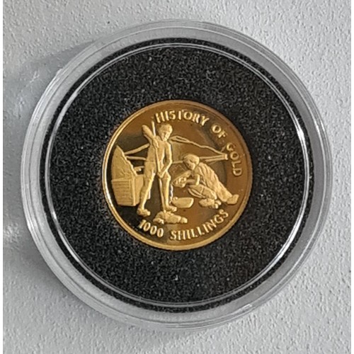 2 - 24ct Gold Proof Coin, 1.244 g. Issue limit 25,000. Obverse: Gold Prospecting. Reverse  Tanzania Coat... 