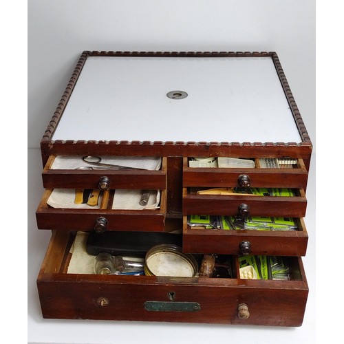 334 - Vintage 13-drawer wooden medical cabinet to include contents. Collection only.