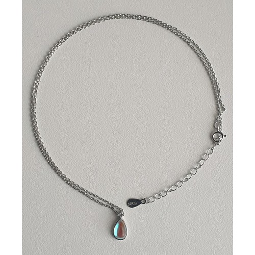 29 - (2) .925 silver and turquoise pendants on chains. Shipping Group (A).