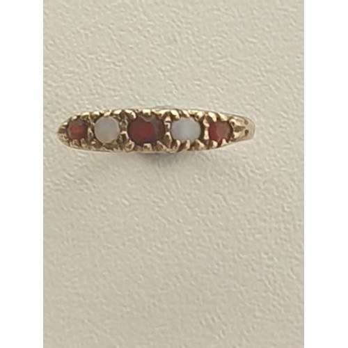 41 - 9ct gold garnet and white opal five-stone set ring, gross weight 1.3g size J. Shipping Group (A).