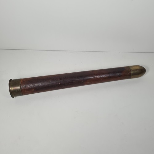 333 - Reproduction artillery shell made of hardwood and having brass tip and base. Collection only.