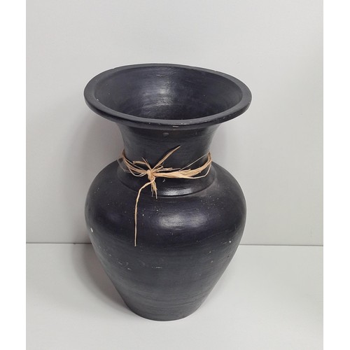 372 - Large black painted pottery vase, H:51 cm. Collection only.