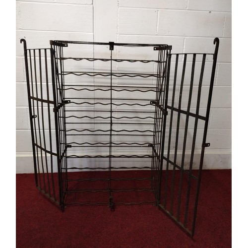 311 - Antique iron wine cage, H:77 x W:125 x D:37 cm.  Having lift-up hinged doors with locking brackets. ... 