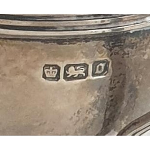 24 - Silver sauce boat and double handed trophy, hallmarks for Sheffield and Birmingham. Shipping Group (... 