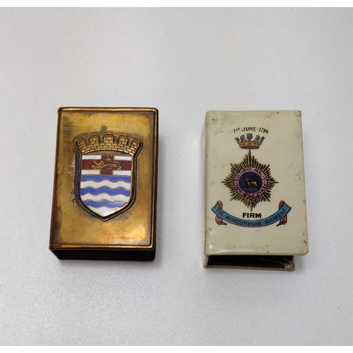 102 - (2) wartime enamelled matchbox covers. Shipping Group (A).