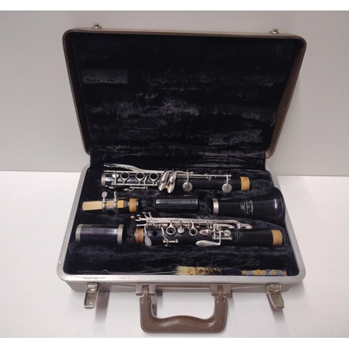 155 - Buescher Aristocrat clarinet in protective carry case. Shipping Group (A).