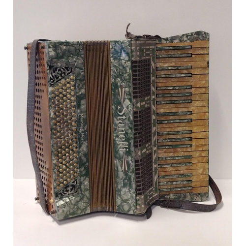 249 - A Stanelli Italian vintage accordian in original hard carry case. Collection only.