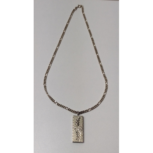 11 - London hallmark silver ingot pendant and figaro link chain, 31g. Shipping Group (A).