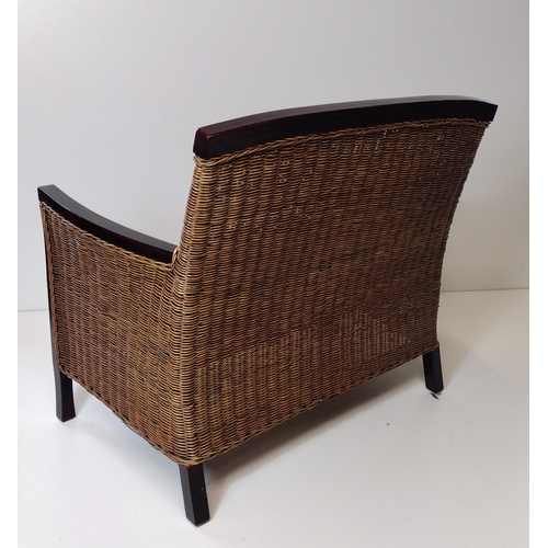 310 - Wooden-frame and rattan 2-seater settee. Collection only.