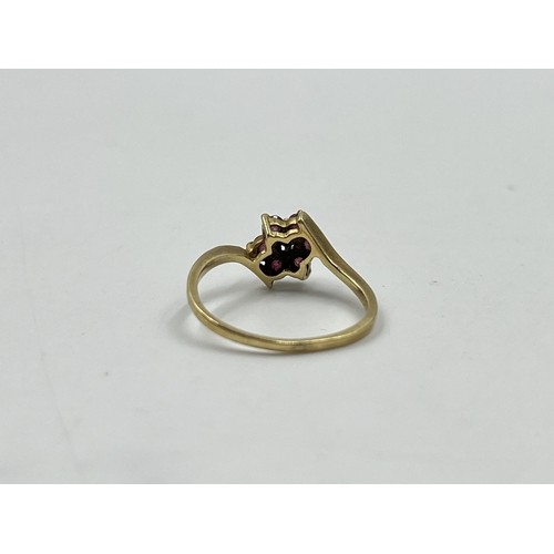 45 - 9ct gold ruby and diamond floral dress ring, size N. Shipping Group (A).