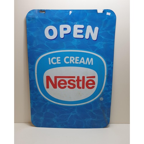 169A - Nestlé metal advertising sign measuring 70x50cm. Collection only.